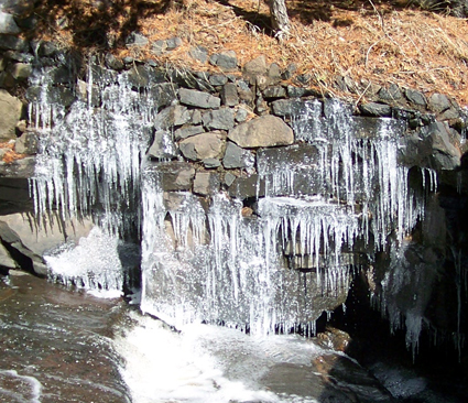 ice along the side of the falls
