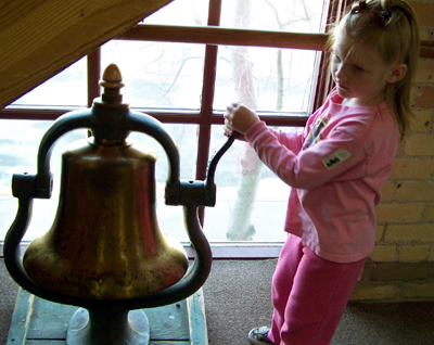 Rosa ringing the bell