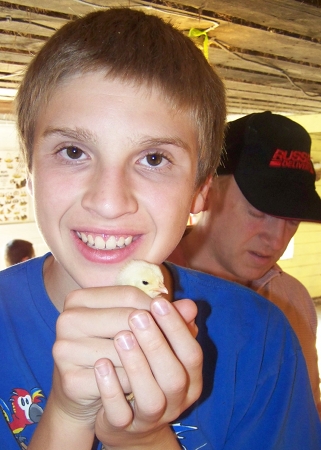 Caleb with a baby chick
