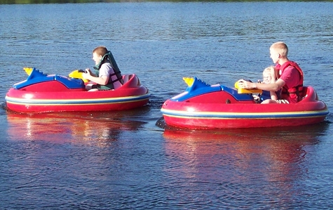 Alex chasing Corbin in the fun boats