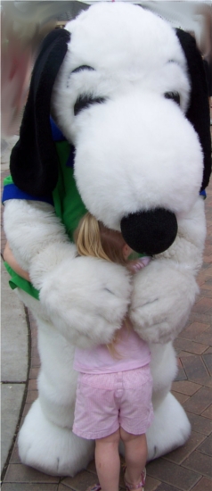 Anna hugging Snoopy