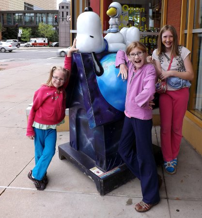 the girls with the Snoopy statue