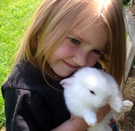 Ella hugging another bunny