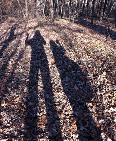 Anna and Shannon's shadows on the fallen leaves
