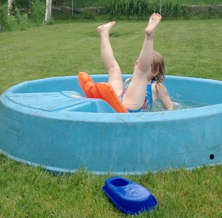 Ella falling into the pool