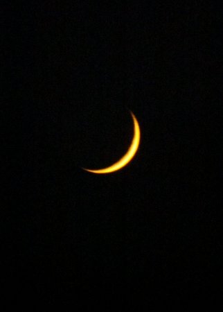 the smiling sliver of the moon