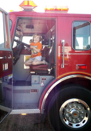 Ella in a fire truck