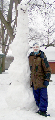 Alex with a bigger snowman