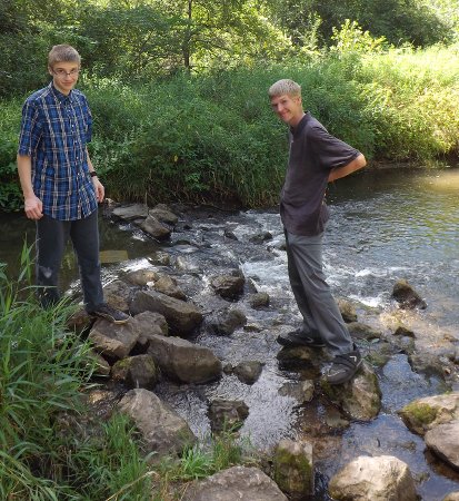Alex and Caleb at the creek