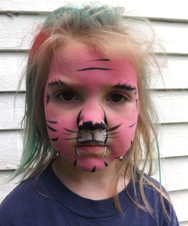 close up of her tiger face paint
