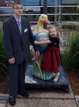 Caleb and Ella with the goose statue