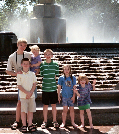 the kids in front of the fountain