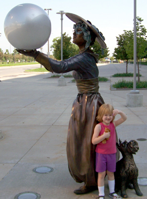 Rosa with the lady statue