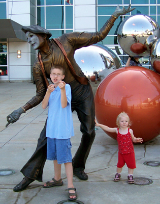 Caleb, Anna, and a mime statue