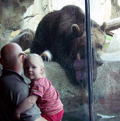 Lee and Anna watching a bear