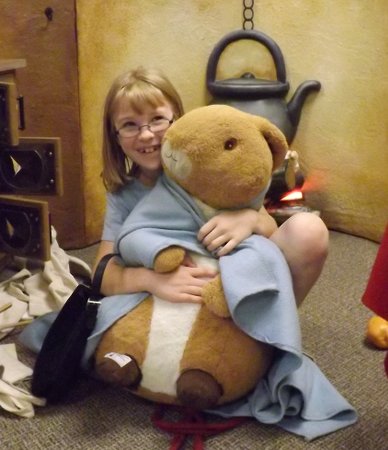 Anna with a stuffed rabbit