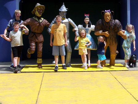 the kids with the characters from Oz