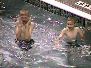 Alex and Caleb swimming