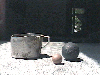 tin cup and balls